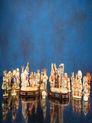 A fine collection of twenty-eight Beatrix Potter Figurines and one Beatrix Potter Thimble.