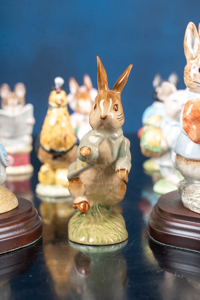A fine collection of twenty-eight Beatrix Potter Figurines and one
