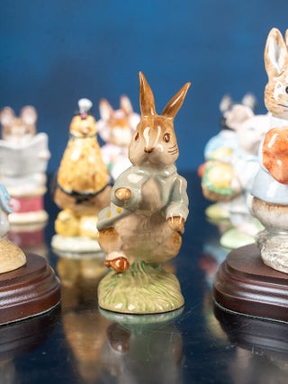A fine collection of twenty-eight Beatrix Potter Figurines and one Beatrix Potter Thimble.