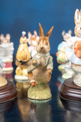 A fine collection of twenty-eight Beatrix Potter Figurines and one Beatrix Potter Thimble.